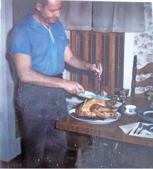 Dad carves the bird.jpg