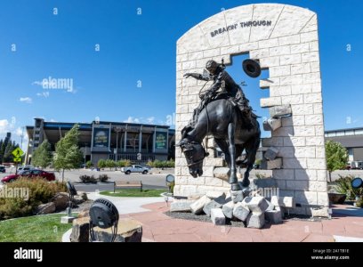 laramie-wy-usa-september-28-2019-breakin-through-bronze-statue-at-war-memorial-stadium-at-the-...jpg