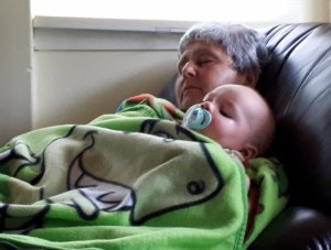 Aiden & Auntie Lorie Snoozing.jpg