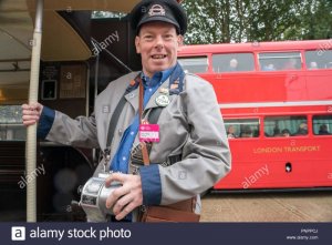 jason-tandy-dressed-as-a-bus-conductor-at-the-london-transport-museum-depot-which-opens-its-do...jpg