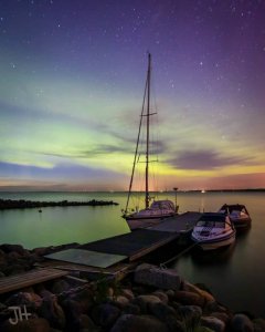 blue boats at the jetty beach.jpg