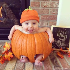 kid in pumpkin.jpg