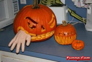 389749765-funny_halloween_pumpkin_eating_the_hand.jpg