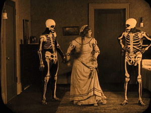 lady punching skeletons.gif