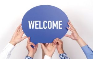 group-people-holding-welcome.jpg