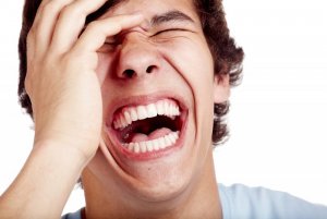 bigstock-Laughing-out-loud-young-man-fa-108266420.jpg