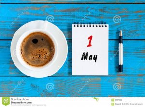 may-st-day-month-calendar-white-notepad-morning-coffee-cup-work-place-background-top-view-spri...jpg