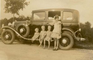 Mom_Sylvia&brothers-on-car(1).jpg