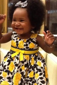 Cute baby in yellow.jpeg