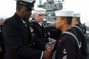 US_Navy_051003-N-9866B-004_Chief_Boatswain's_Mate_Keith_Oliver,_left,_evaluates_his_Sailors_du...jpg