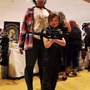 More Cosplay. Grandson Kirk as Daryl Dixon from the TV show The Walking Dead, and his Mommy as a "pet" zombie. I was told that the actor who