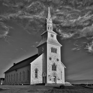 I took this shot in Nova Scotia and edited it to create a black & white image.  It was a beautiful church.