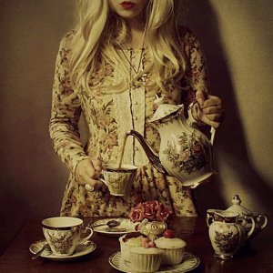 a beautiful blonde antique tea time