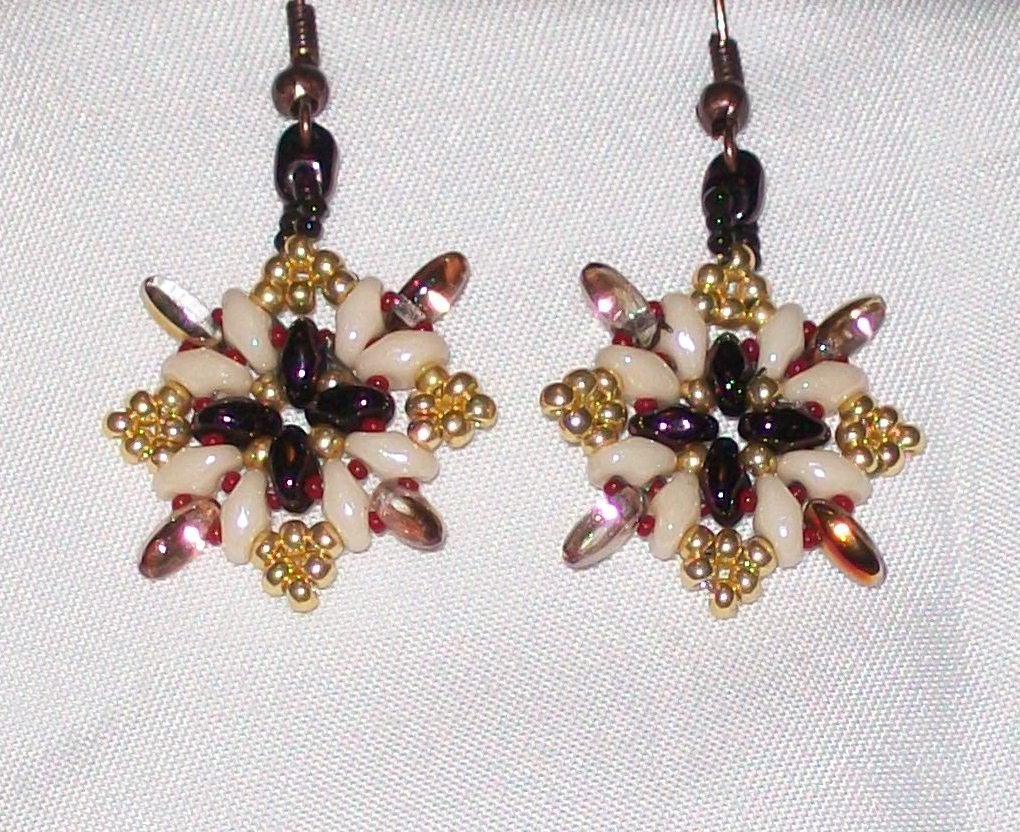1 100 4168 Brown Star Earrings