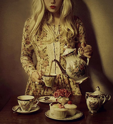 a beautiful blonde antique tea time