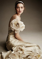 a beautiful brunette with satin flower gown SM