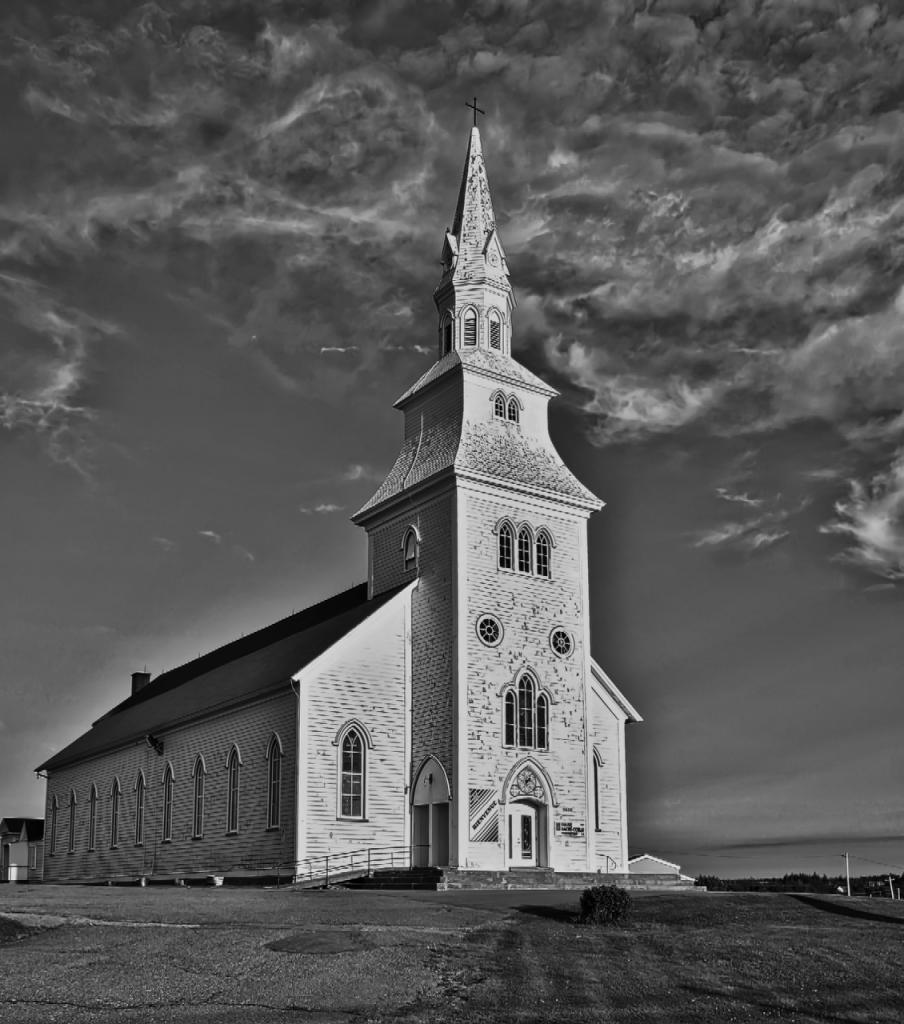 I took this shot in Nova Scotia and edited it to create a black &amp; white image.  It was a beautiful church.