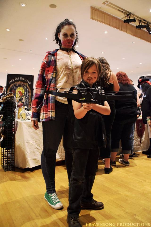 More Cosplay. Grandson Kirk as Daryl Dixon from the TV show The Walking Dead, and his Mommy as a &quot;pet&quot; zombie. I was told that the actor who